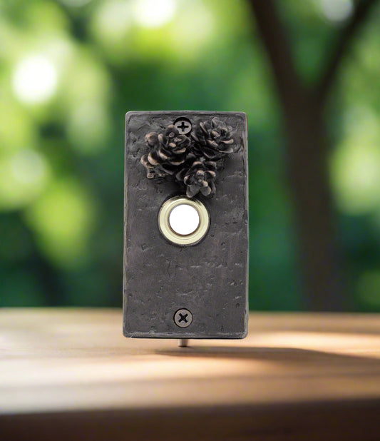 Rectangular Bronze doorbell with three Hemlock pines cones