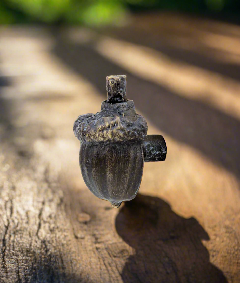 Bronze acorn cabinet knob with stem. Side view.