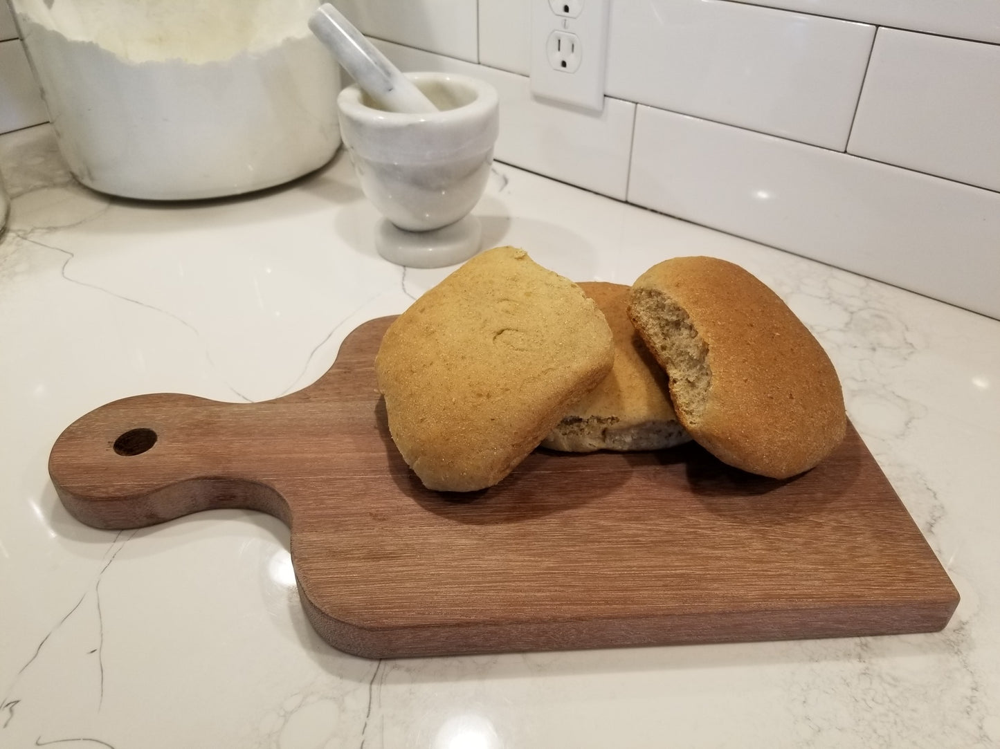 Look at this artisan bread board that holds your moms best whole wheat buns.