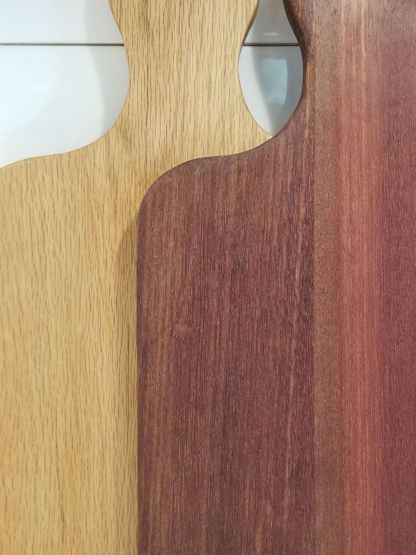 Wood bread cutting boards with different finishes