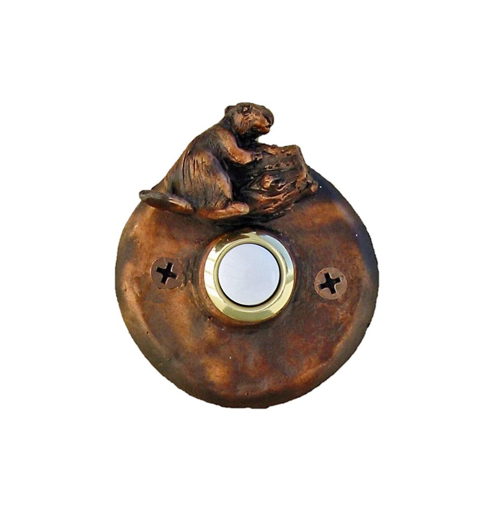 Round bronze doorbell with beaver gnawing a tree branch